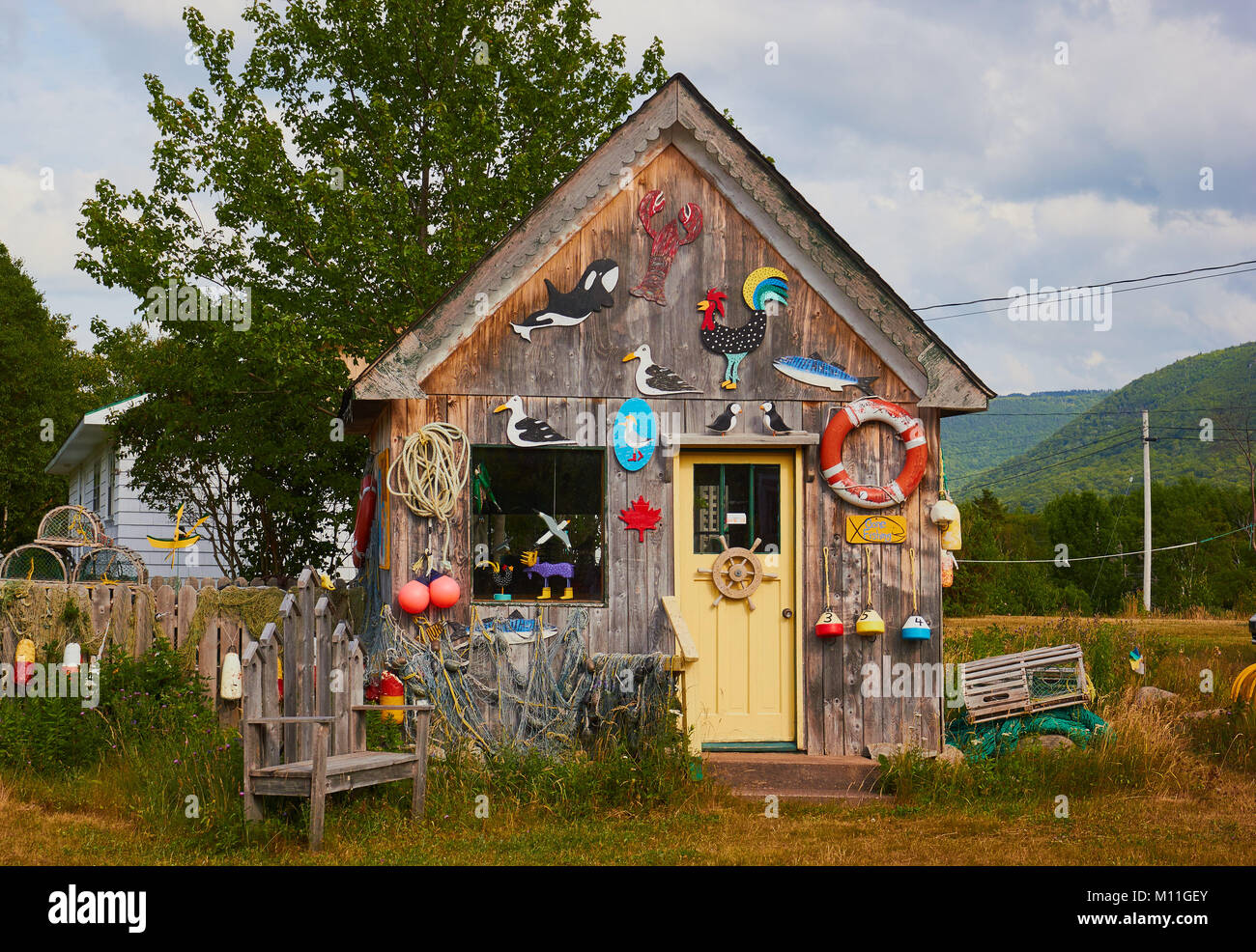 Folk Art Shop, piacevole Bay, Cape Breton Island, Nova Scotia. Negozio di proprietà da Reed Timmons che lavora in lobster industria della pesca e crea arte folcloristica Foto Stock