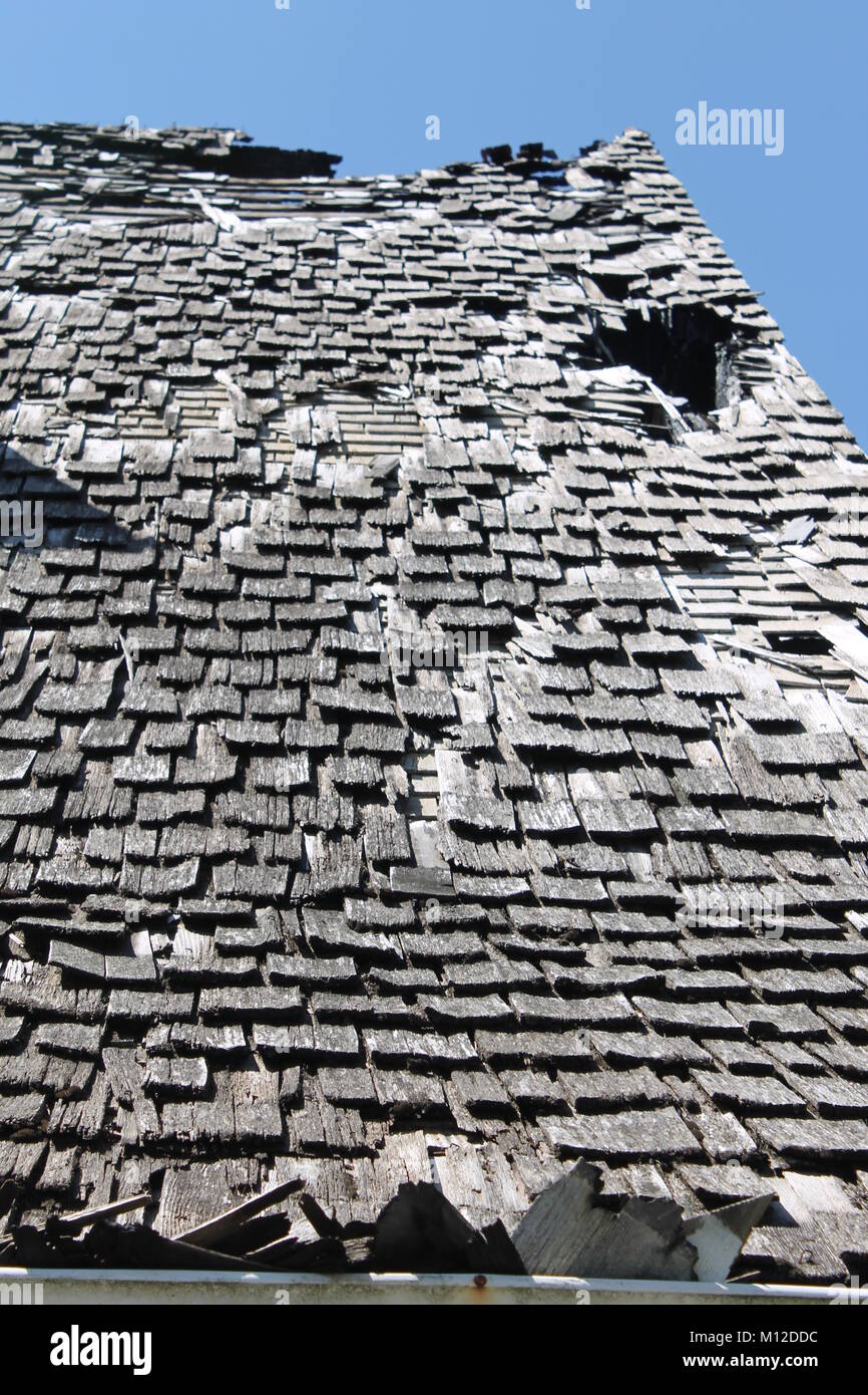 Fire danneggiato tetto storico Foto Stock