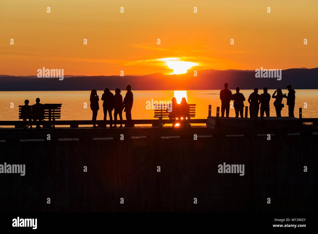 Canada, Provincia di Quebec, Bas-Saint-Laurent regione, Kamouraska, Miller quay al tramonto, ombre Foto Stock