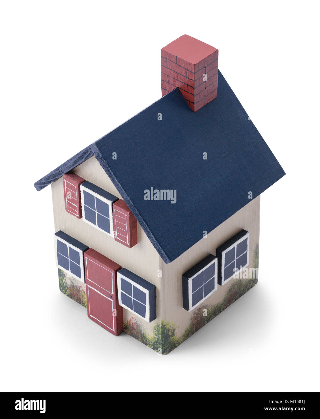 Toy modello di legno casa isolata su uno sfondo bianco. Foto Stock