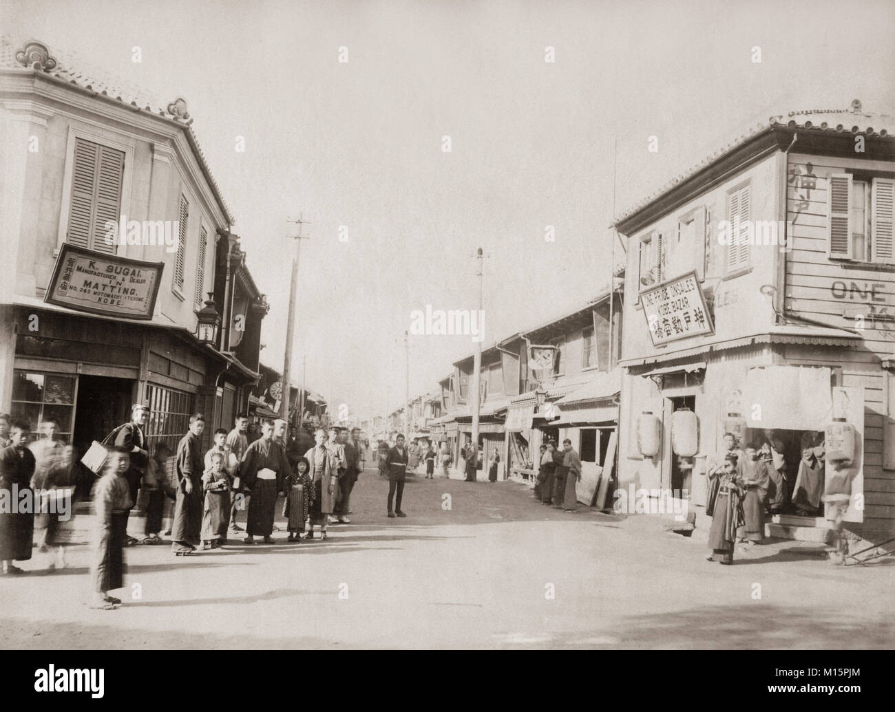 I negozi sulla strada di Motomachi, Kobe, Giappone, c.1890 Foto Stock