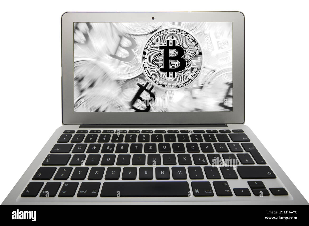 Immagine simbolo della turbolenza, volatilità prezzo stock valuta digitale, oro moneta fisica bitcoin laptop Foto Stock