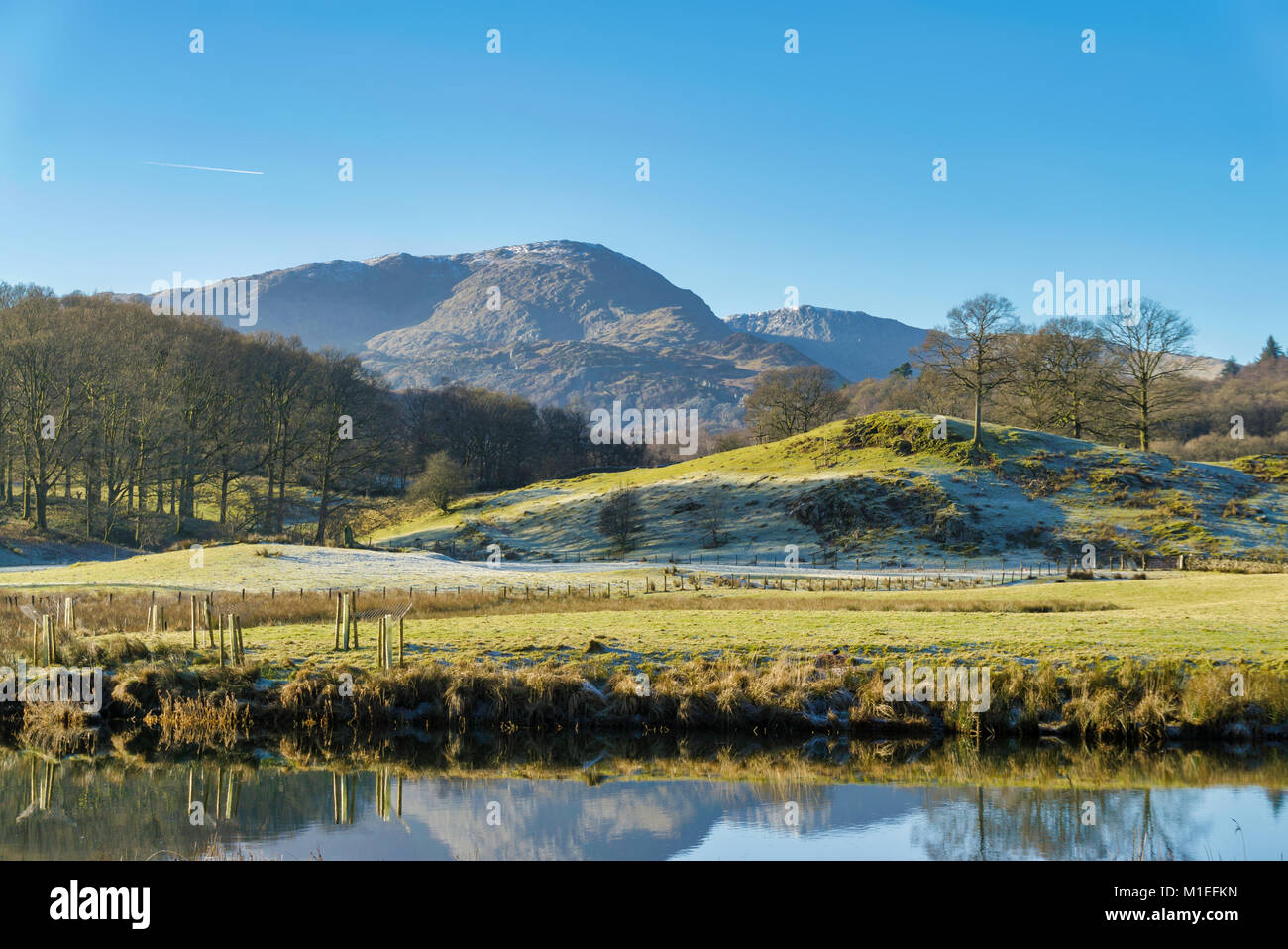 Il Lake District inglese montagna noto come Wetherlam, visto da Elterwater Foto Stock
