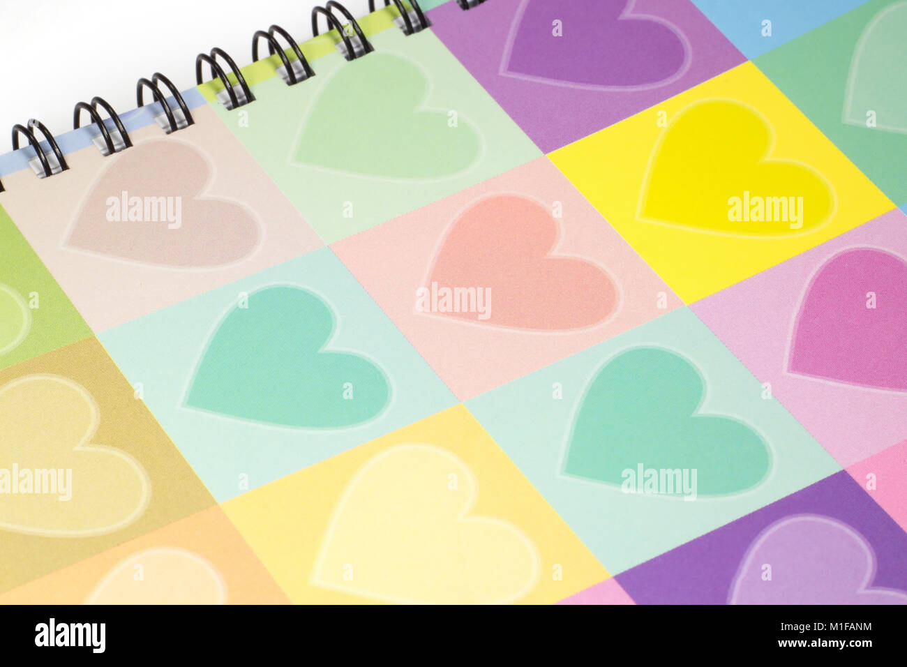 Chiuso cuore colorata grafica notebook di copertura Foto Stock