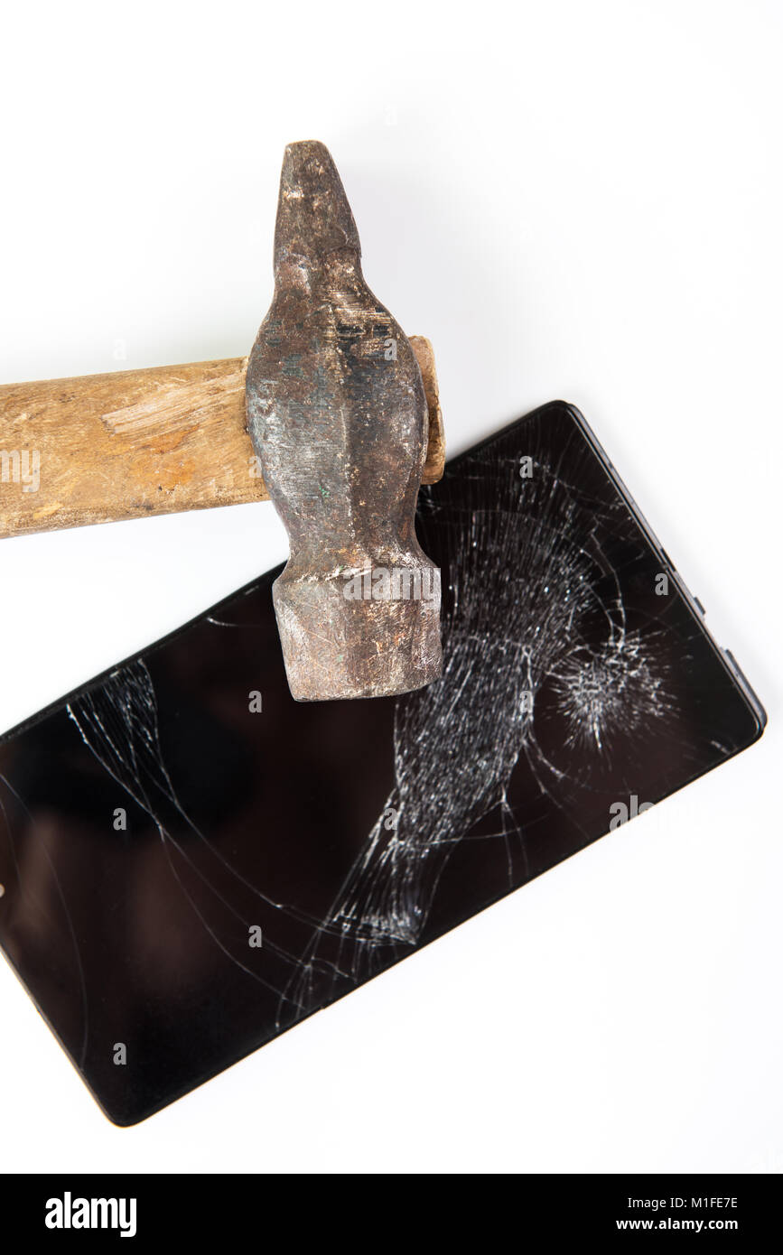 Un vecchio maglio e lo smartphone Foto Stock