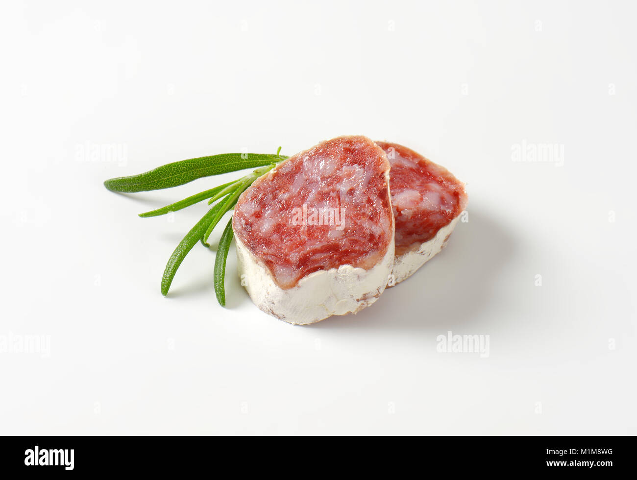 Fette di sottile spagnolo salsiccia secca Foto Stock