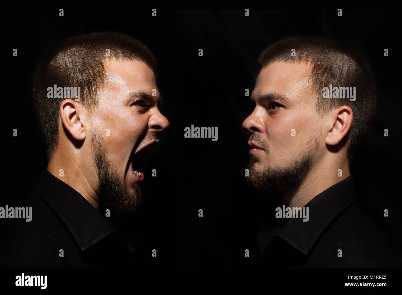 Spaventata volto di uomo spooky al buio. L'uomo è urlare Foto Stock