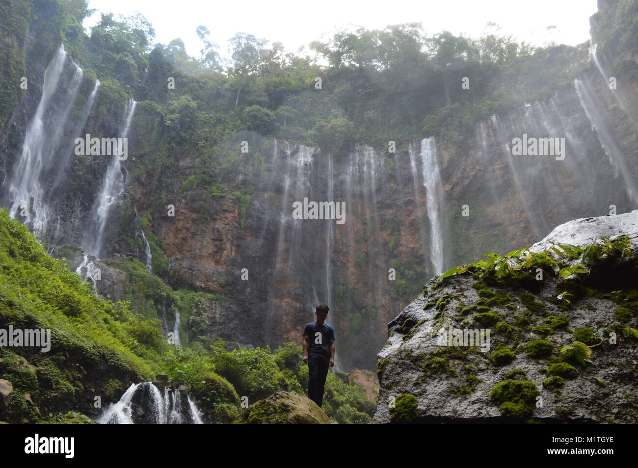 Coban Sewu cascata in Malang Indonesia Foto Stock