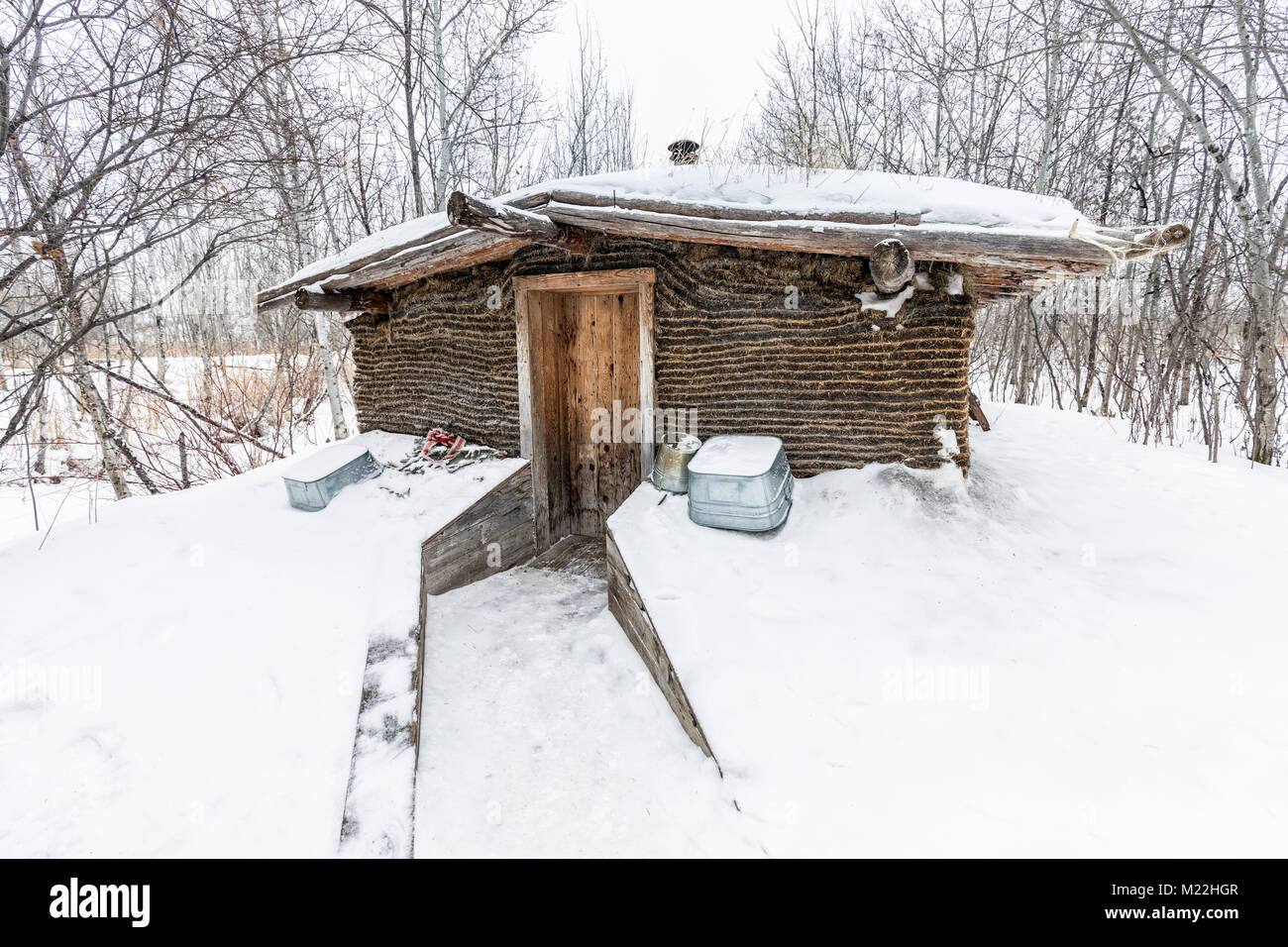Casa Sod in inverno, Manitoba, Canada. Foto Stock