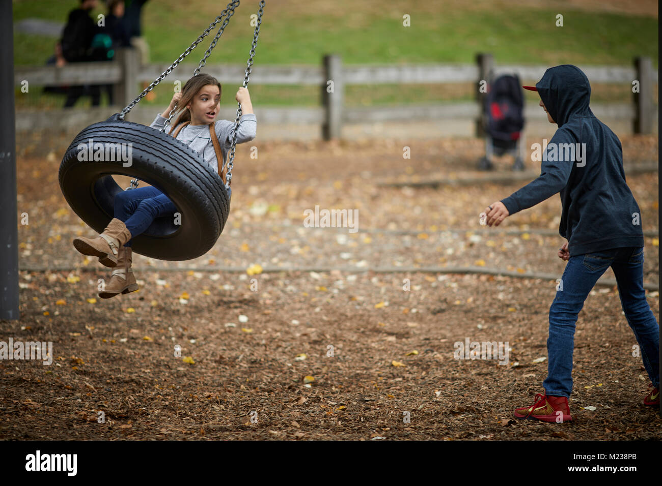 New York City Manhattan Central Park tire swing di area giochi per bambini Foto Stock