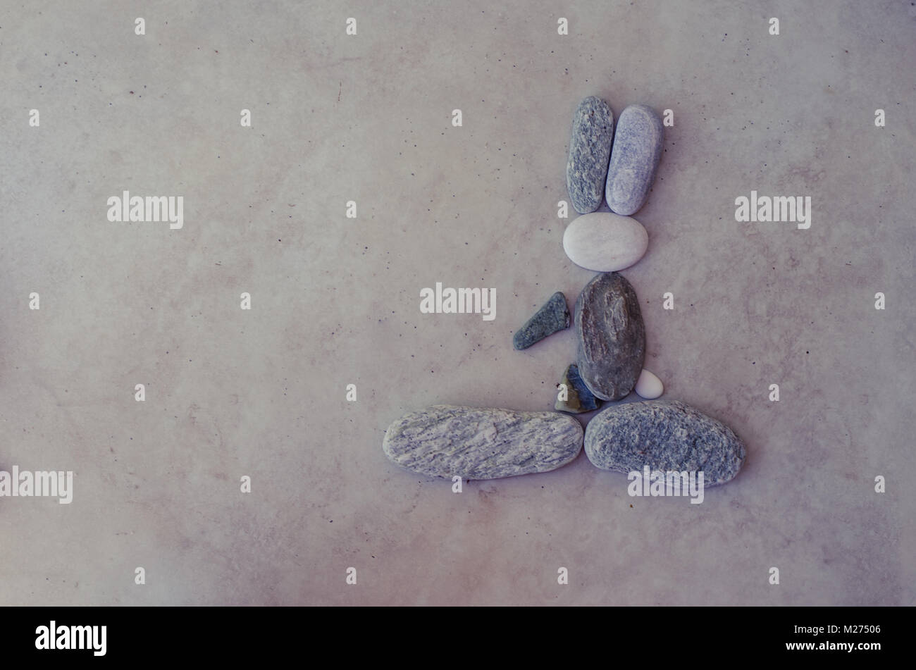 Gruppo di ciottoli a forma di animale di coniglio Foto Stock