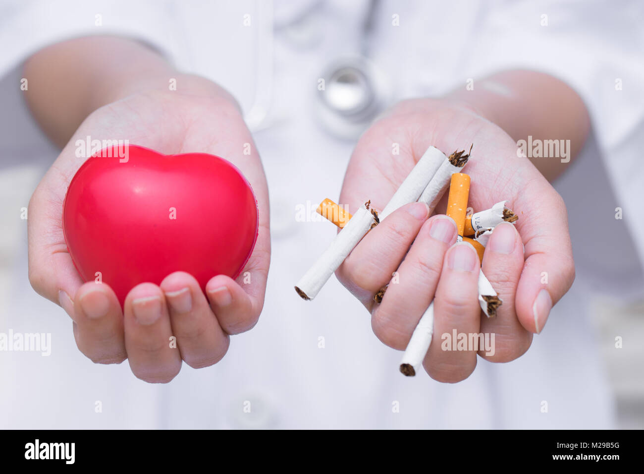 Smettere di fumare,il fumo provoca la salute Foto Stock
