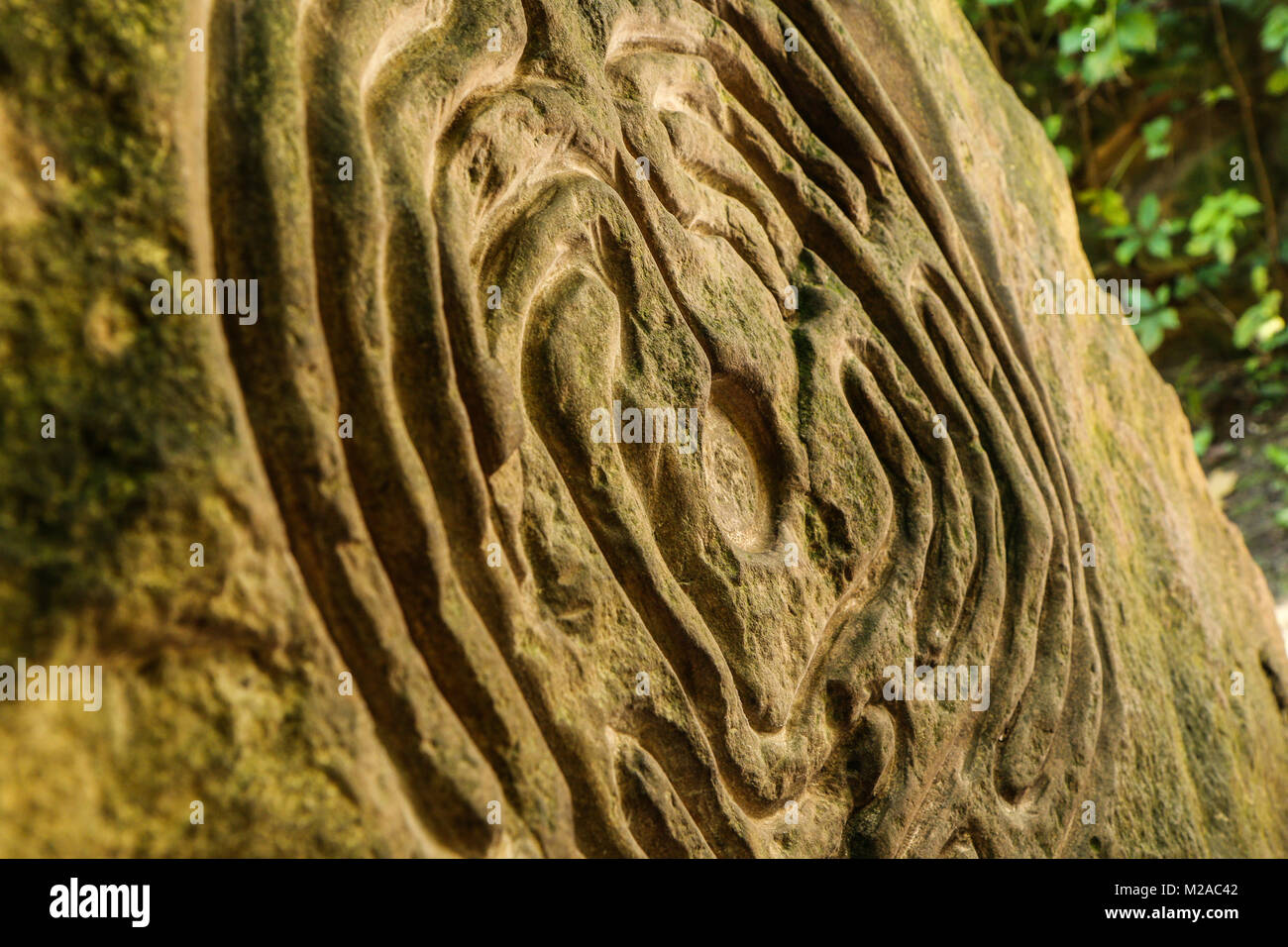 Una particolare immagine di un piccolo labirinto realizzate in pietra arenaria. È possibile passare attraverso utilizzando le dita. Foto Stock