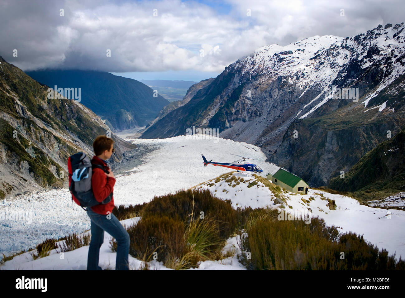 Nuova Zelanda, Isola del Sud, Fox Glacier, turistico trekking dopo essere caduto in elicottero al Cancelliere capanna. Unesco World Heritage Site. Foto Stock