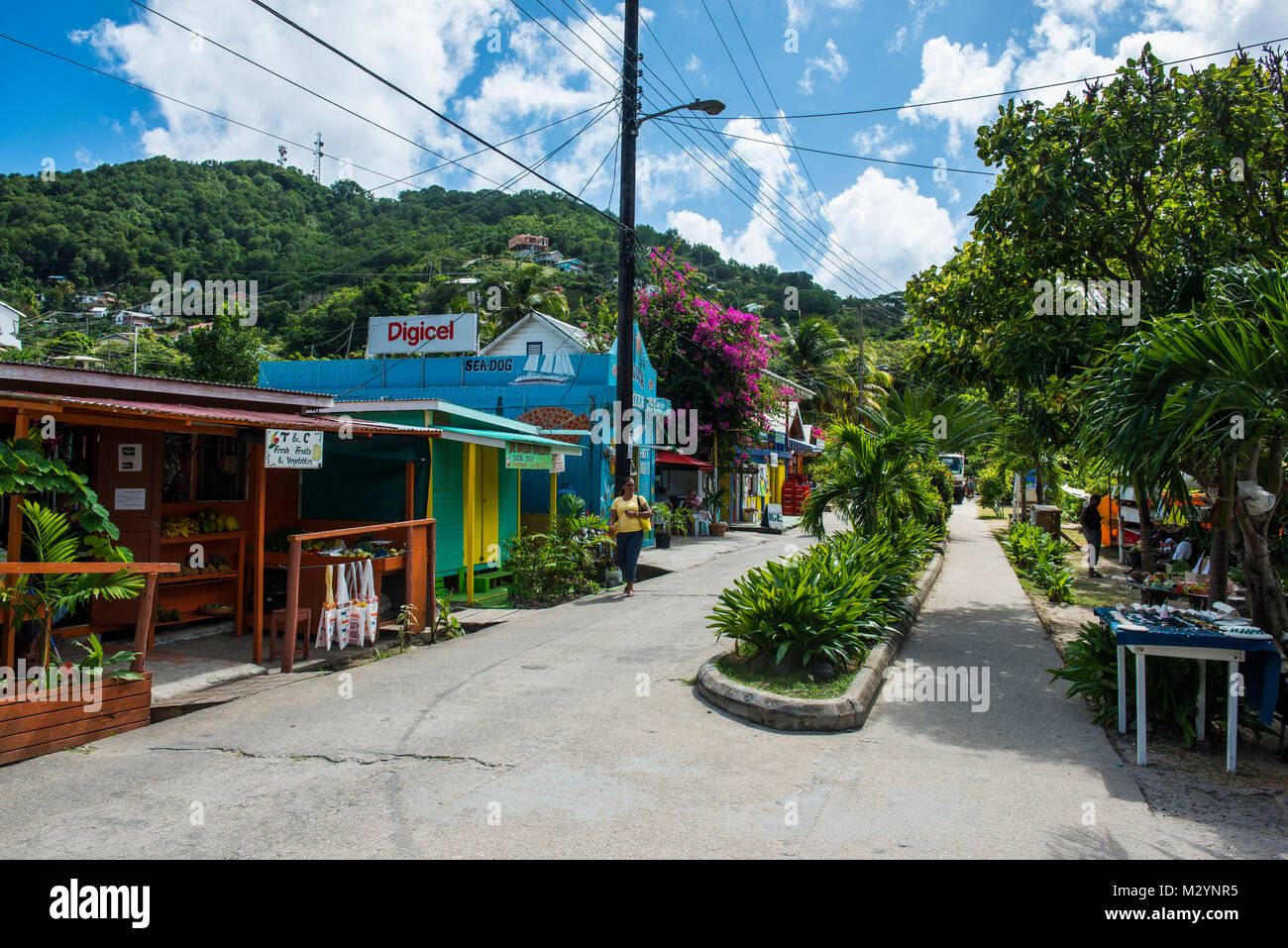 Scena di strada in Port Elizabeth, Bequia, Saint Vincent e Grenadine, Caraibi Foto Stock