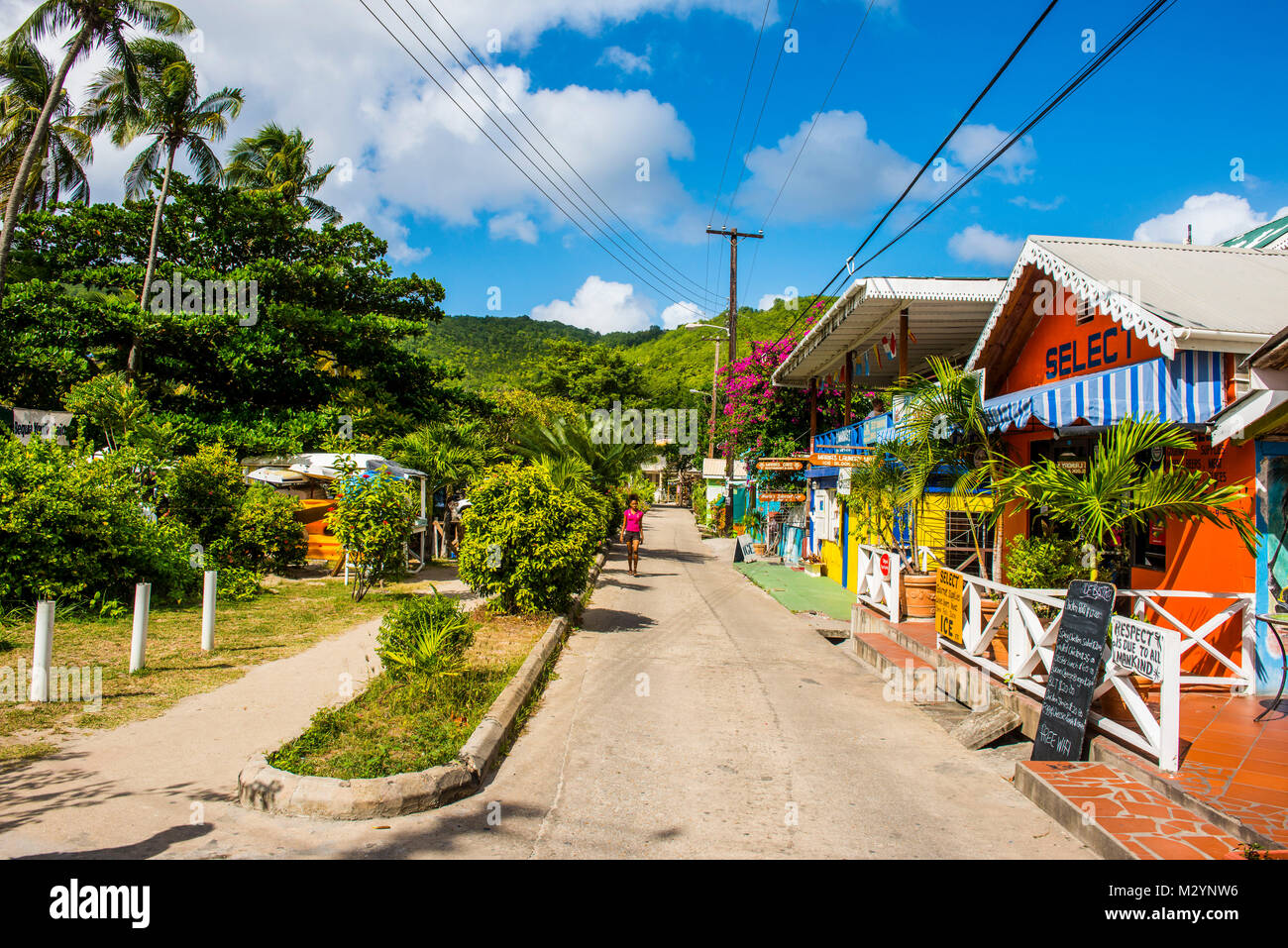 Scena di strada in Port Elizabeth, Bequia, Saint Vincent e Grenadine, Caraibi Foto Stock