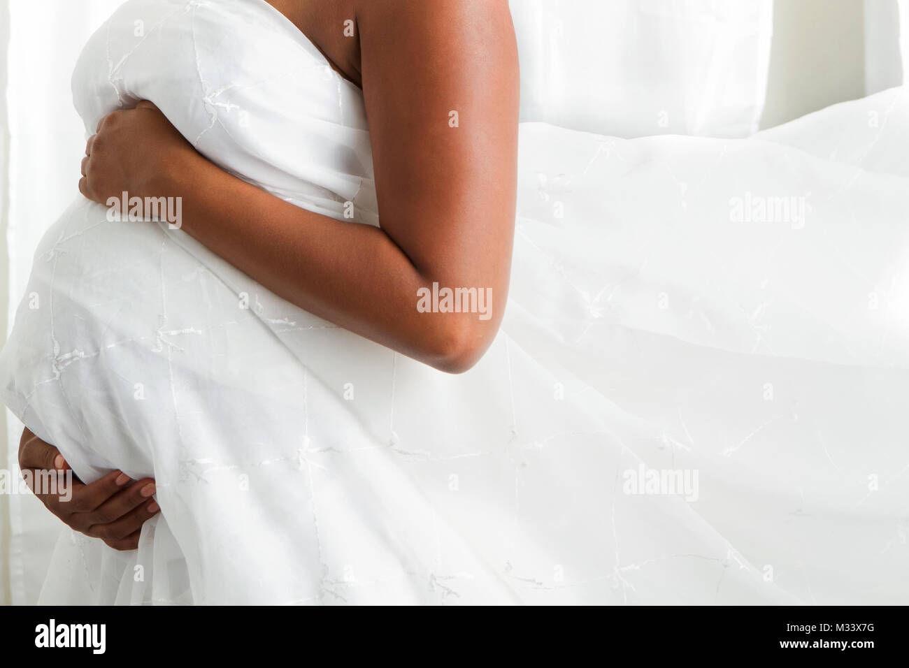 Donna incinta lo stomaco. Foto Stock