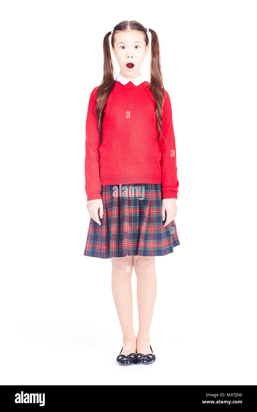 Schoolgirl in uniforme Foto Stock