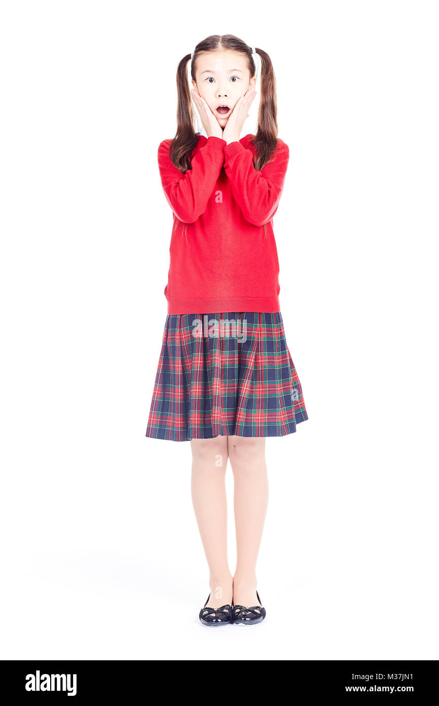 Schoolgirl in uniforme Foto Stock