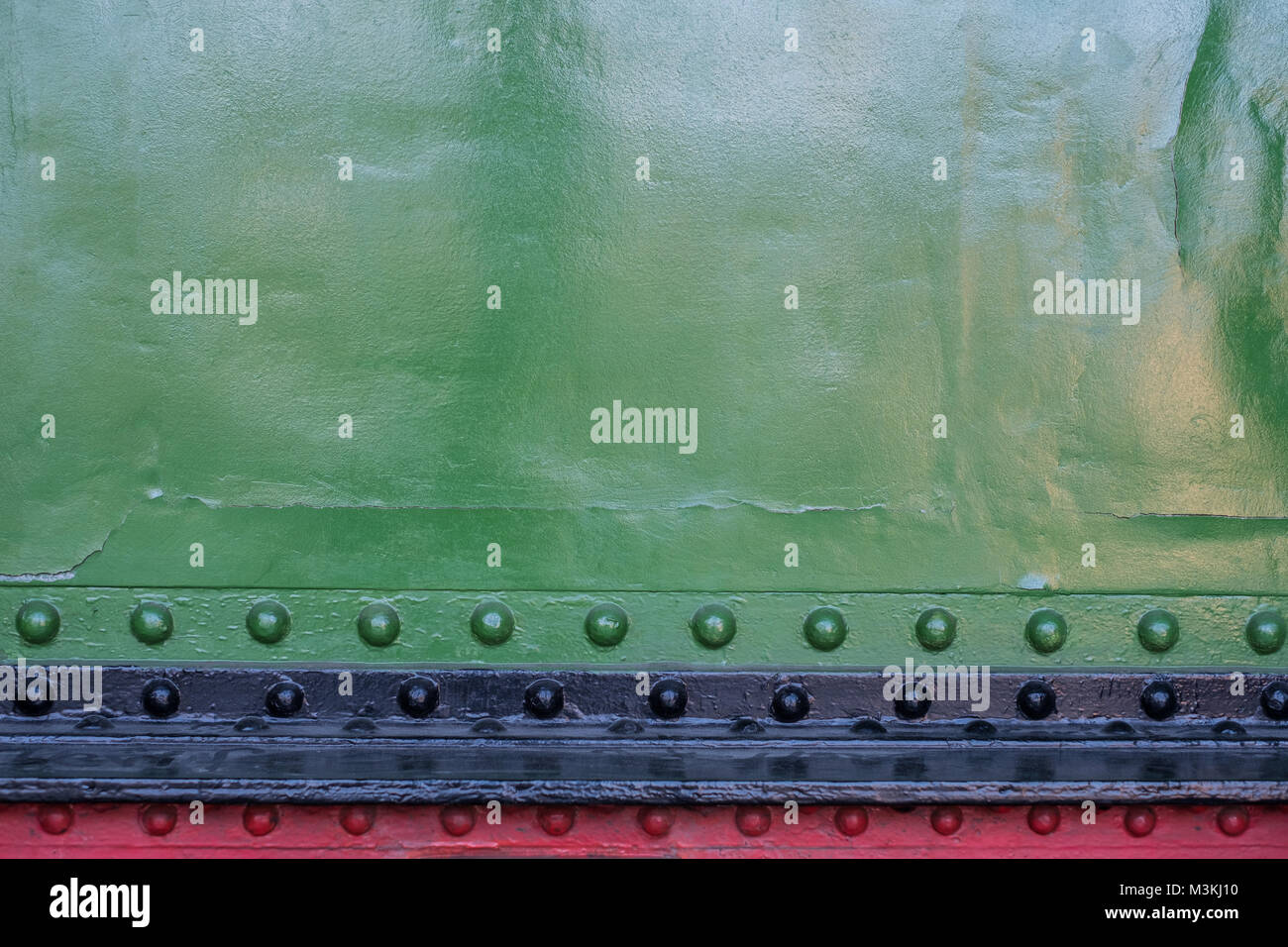 Piastre di metallo con rivetti - locomotore esteriore , ribattuto sfondo in metallo Foto Stock