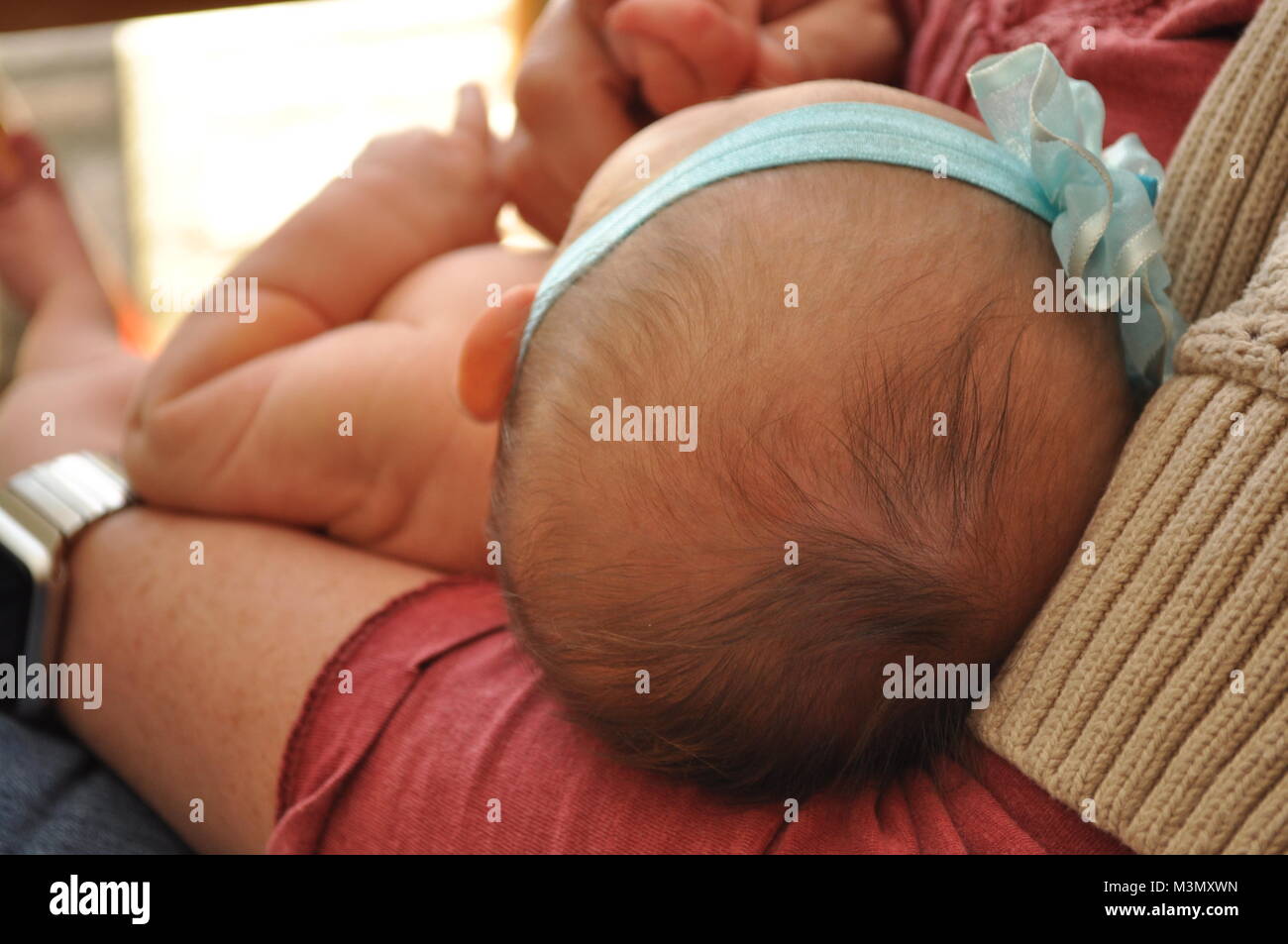 I neonati di testa e capelli Foto Stock