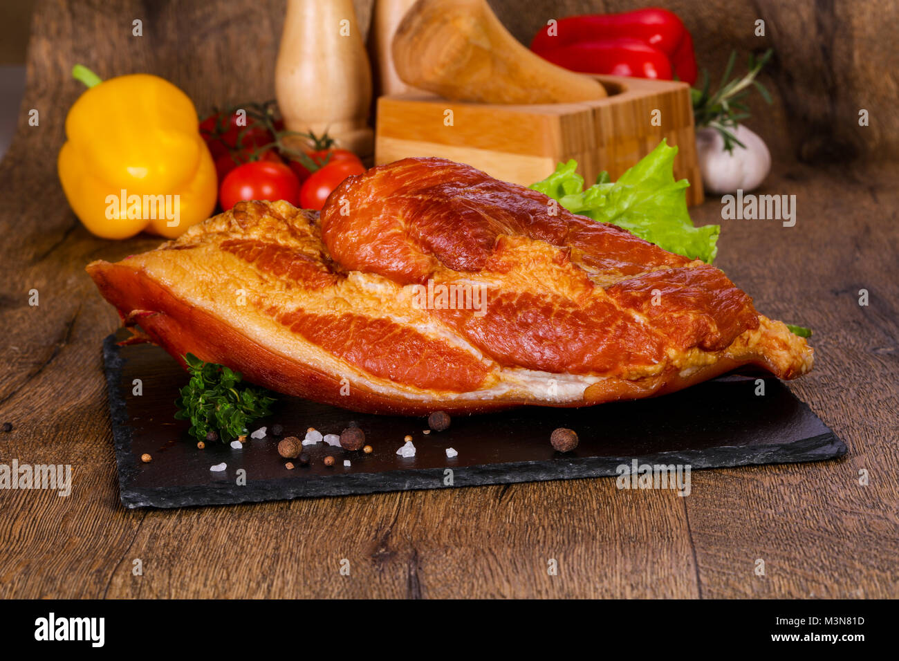 Affumicato di carne di maiale in legno Foto Stock
