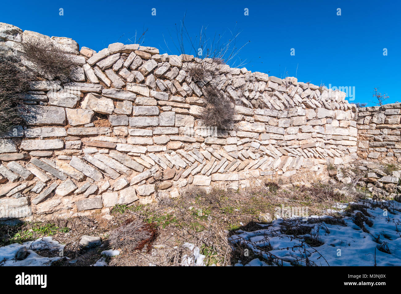 Esempio di costruzione, opus spicatum, tipo di muratura di epoca romana e medievale Foto Stock