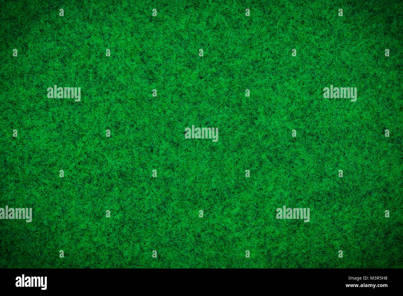 Tappeto verde o verde tessuto di lana closeup texture e background pattern Foto Stock