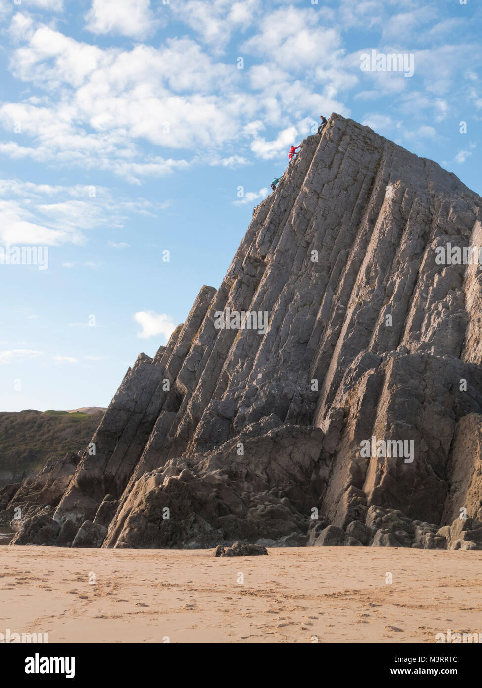 Arrampicata sulle tre scogliere a tre Cliff Bay, Galles del Sud Foto Stock