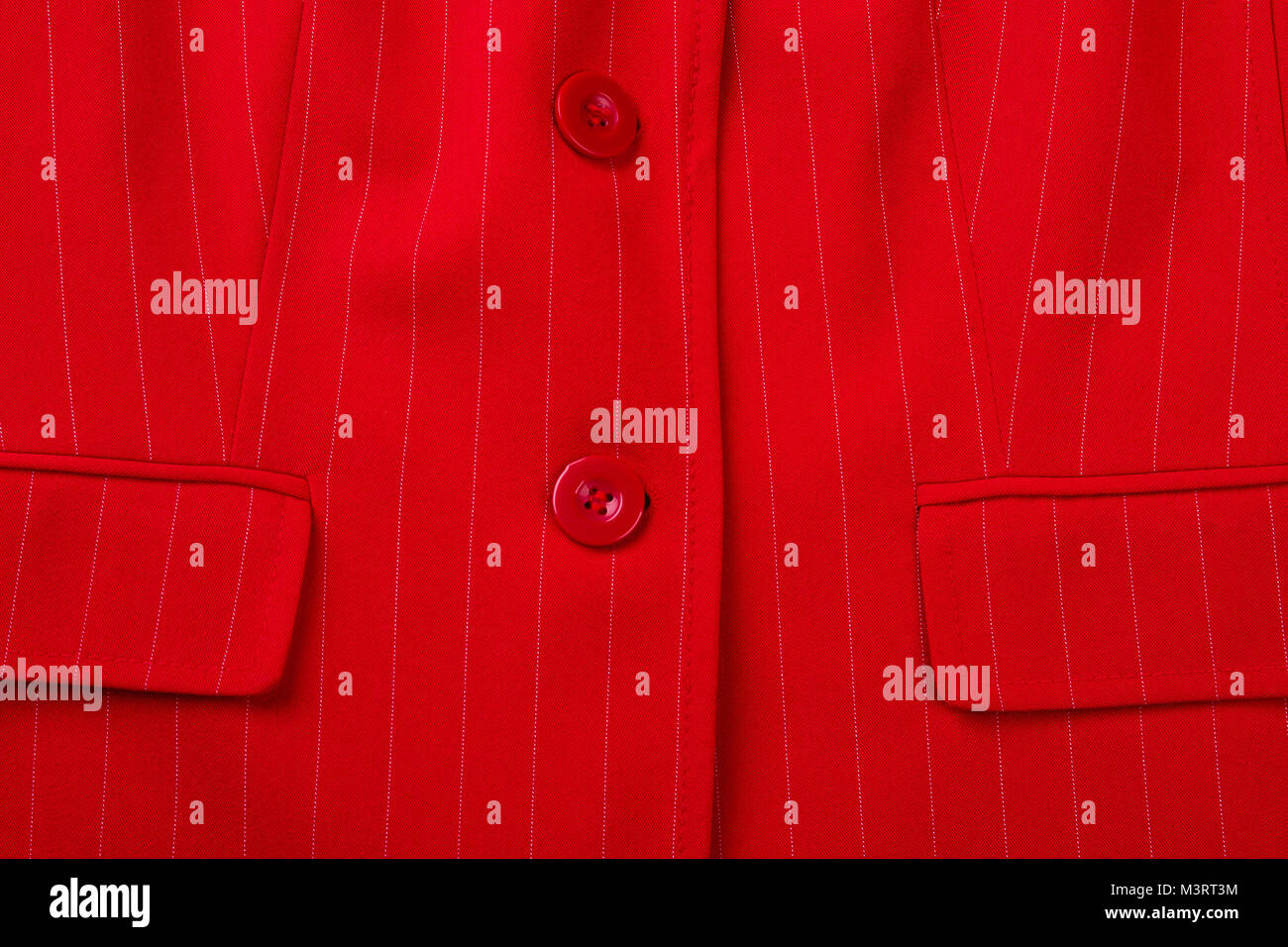 Femmina rossa blazer con pulsanti vicino. Foto Stock