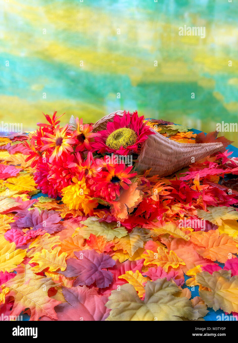 Il raccolto fiori e foglie durante la caduta Foto Stock