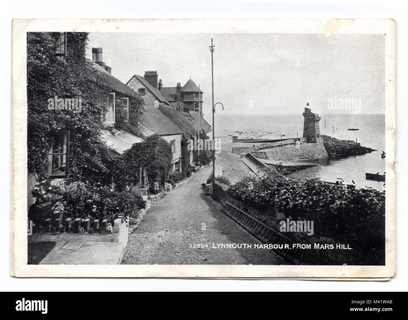 Cartolina, circa 1920, di Lynmouth e il porto, da Marte Hill, N. Devon, Inghilterra, Regno Unito Foto Stock