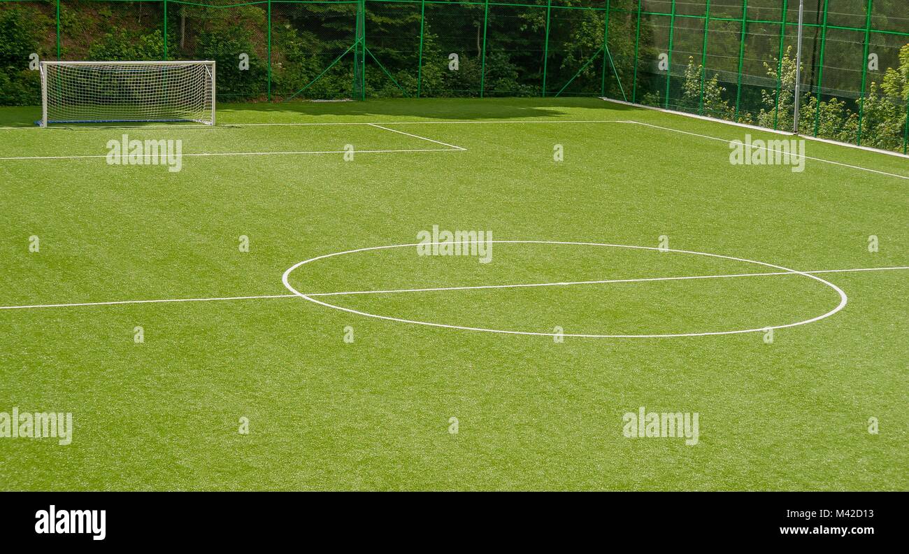 Campo da calcio in erba sintetica Foto Stock