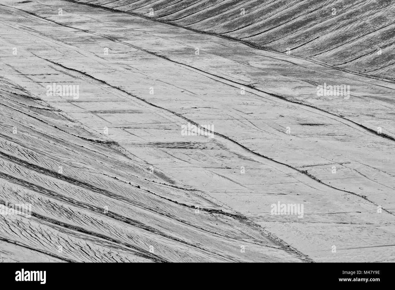 Lavori di sterramento misurare - compattazione loam nero-bianco Foto Stock