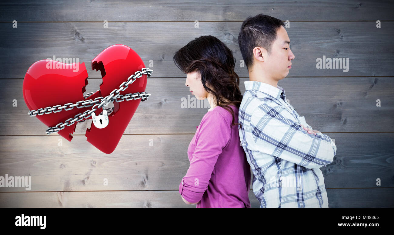 Immagine composita di infastiditi giovane con spalle a ciascun altro Foto Stock