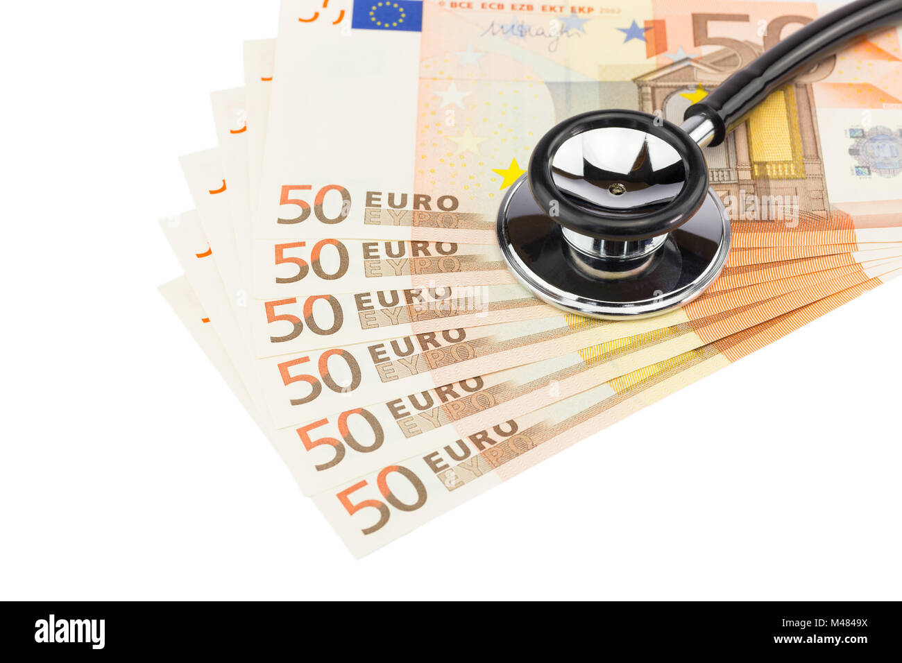 Parte di stetoscopio professionale sulle banconote in euro Foto Stock