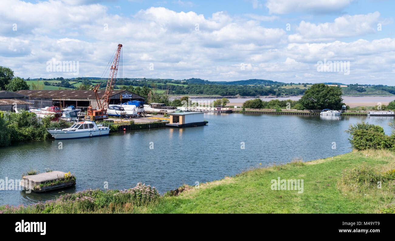 Giunzione del Sharpness-Gloucester Canal e Nitidezza Docks. Fiume Severn in background Foto Stock