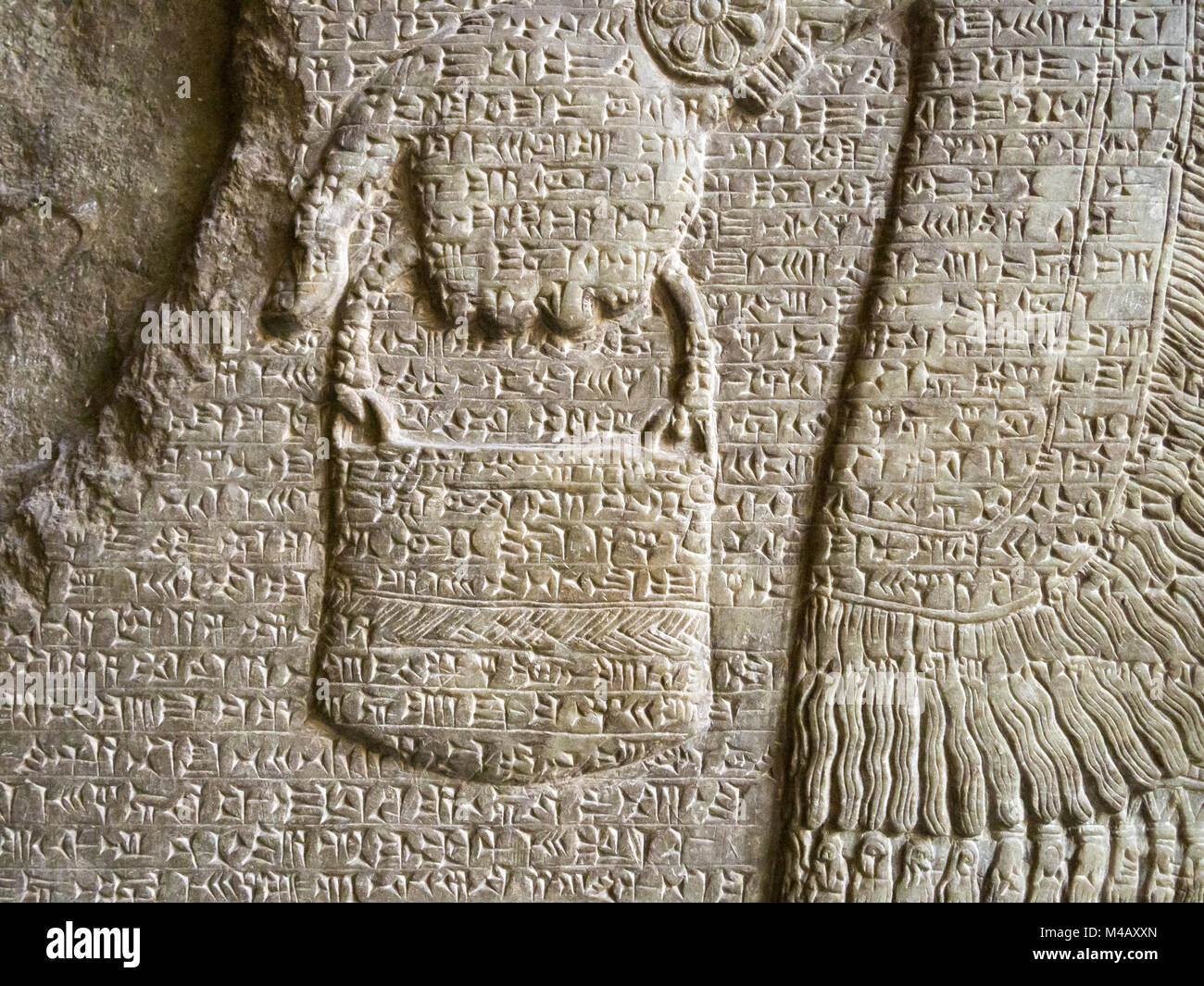 Scrittura cuneiforme assira Foto Stock