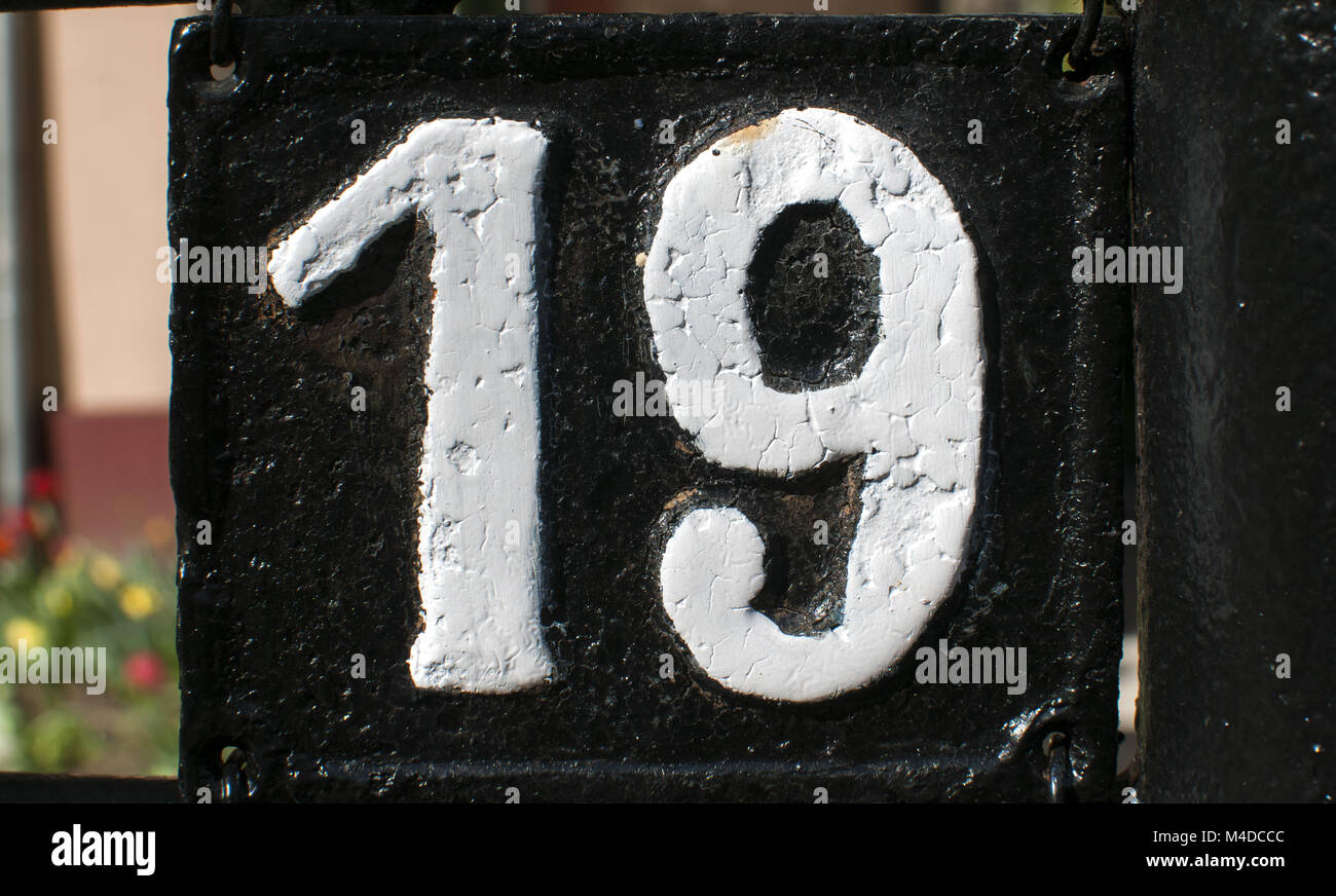 Vecchio retrò ghisa numero piastra 19 Foto Stock