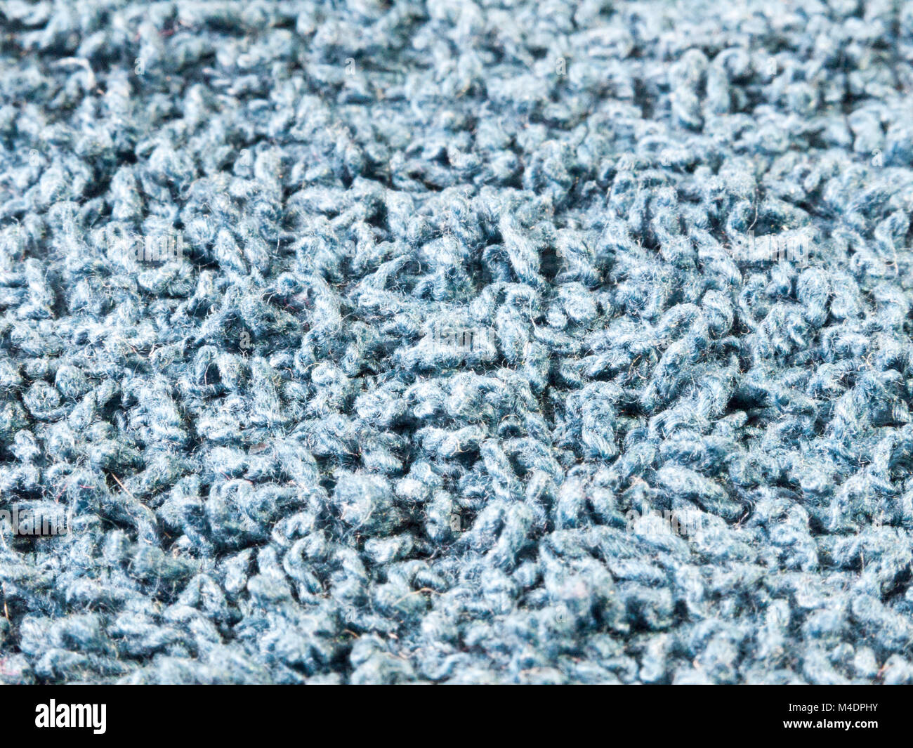Tappeto blu lana di texture Foto stock - Alamy