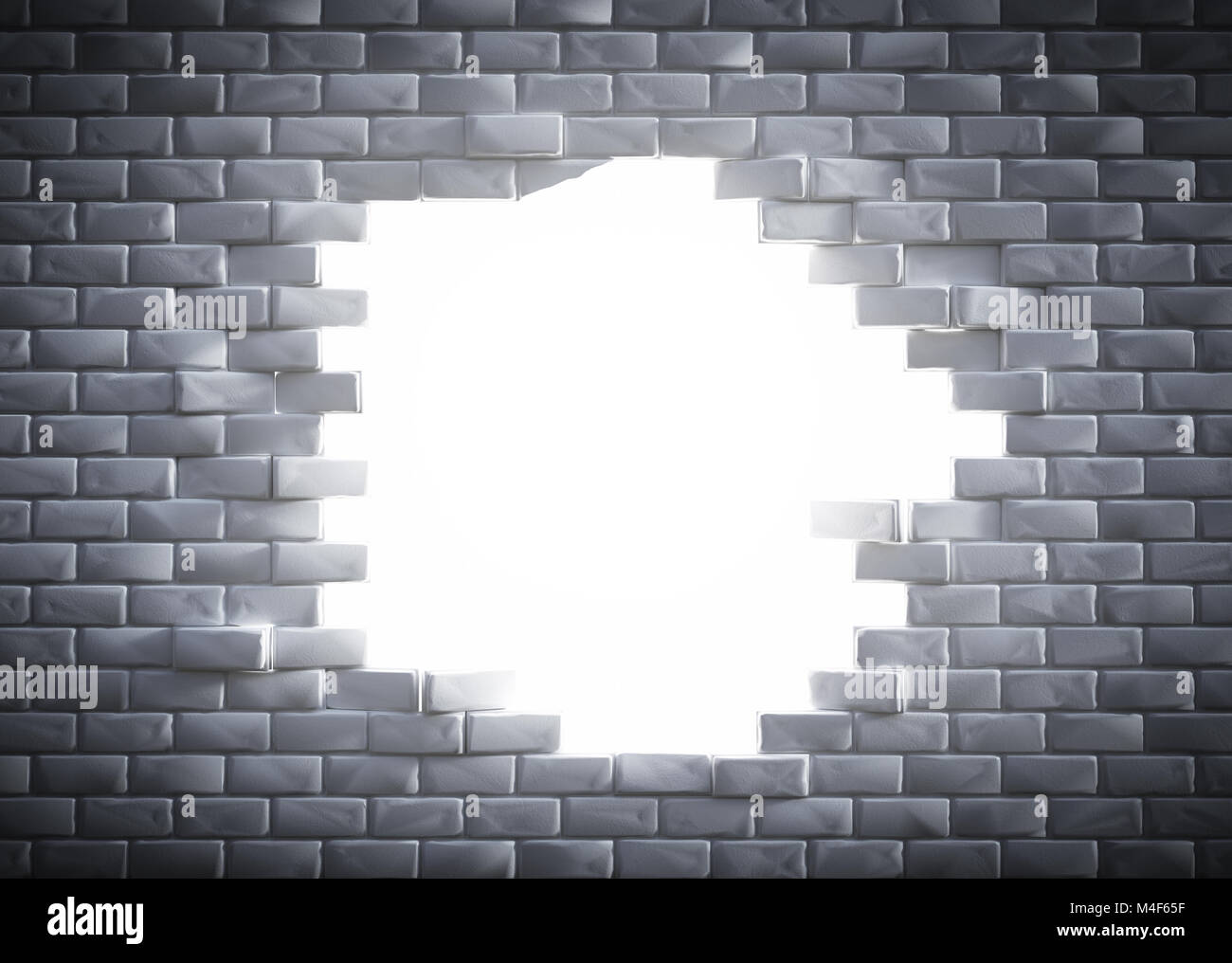 La luce che arriva attraverso un foro in un mattone wal Foto Stock