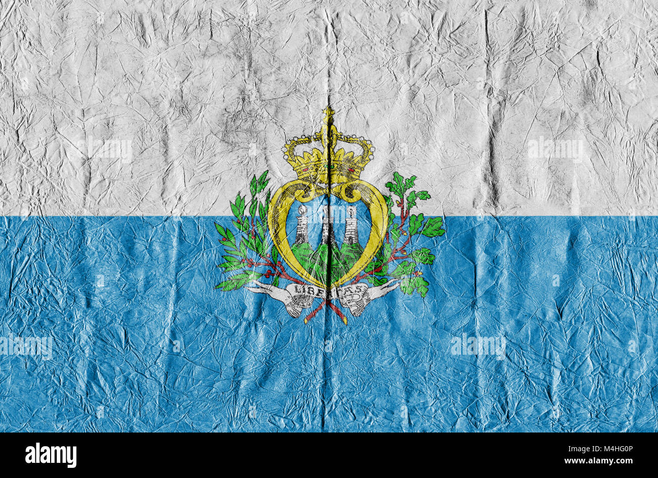 San Marino bandiera su un foglio di carta in close-up Foto Stock