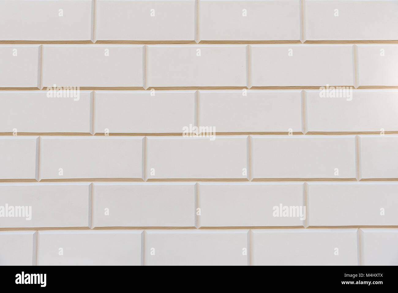 Lo sfondo da bianco rettangolare di blocchi di pietra Foto Stock