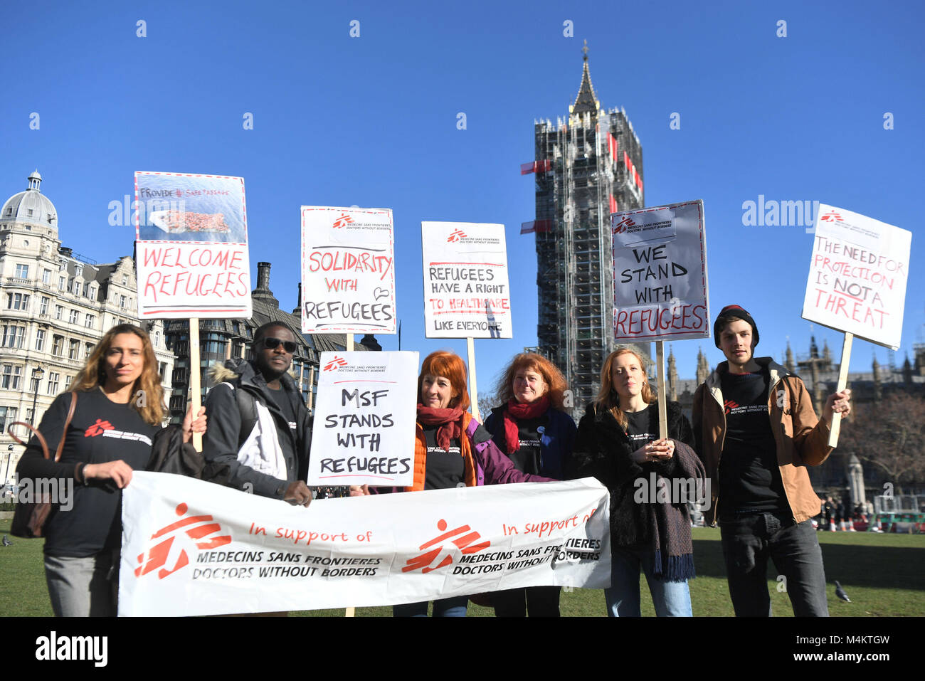 La gente a prendere parte in un giorno senza di noi rally, una giornata nazionale di azione a sostegno dei migranti, in Piazza del Parlamento, Londra. Foto Stock