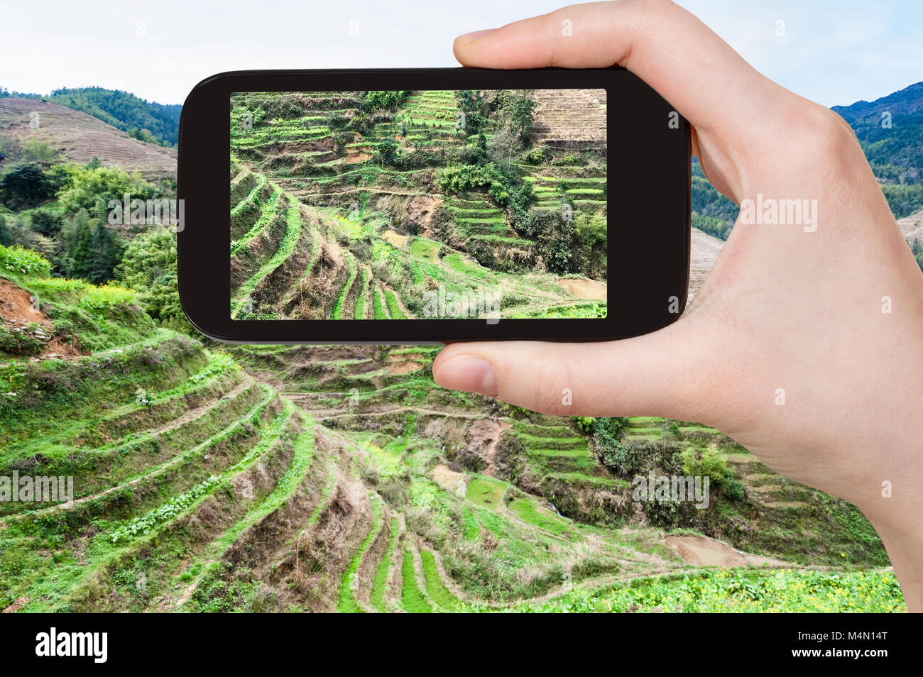 Concetto di viaggio - fotografie turistiche pendio terrazzato con la risaia vicino Dazhai village a Longsheng (Dragon's Backbone, Longji) terrazze di riso county Foto Stock