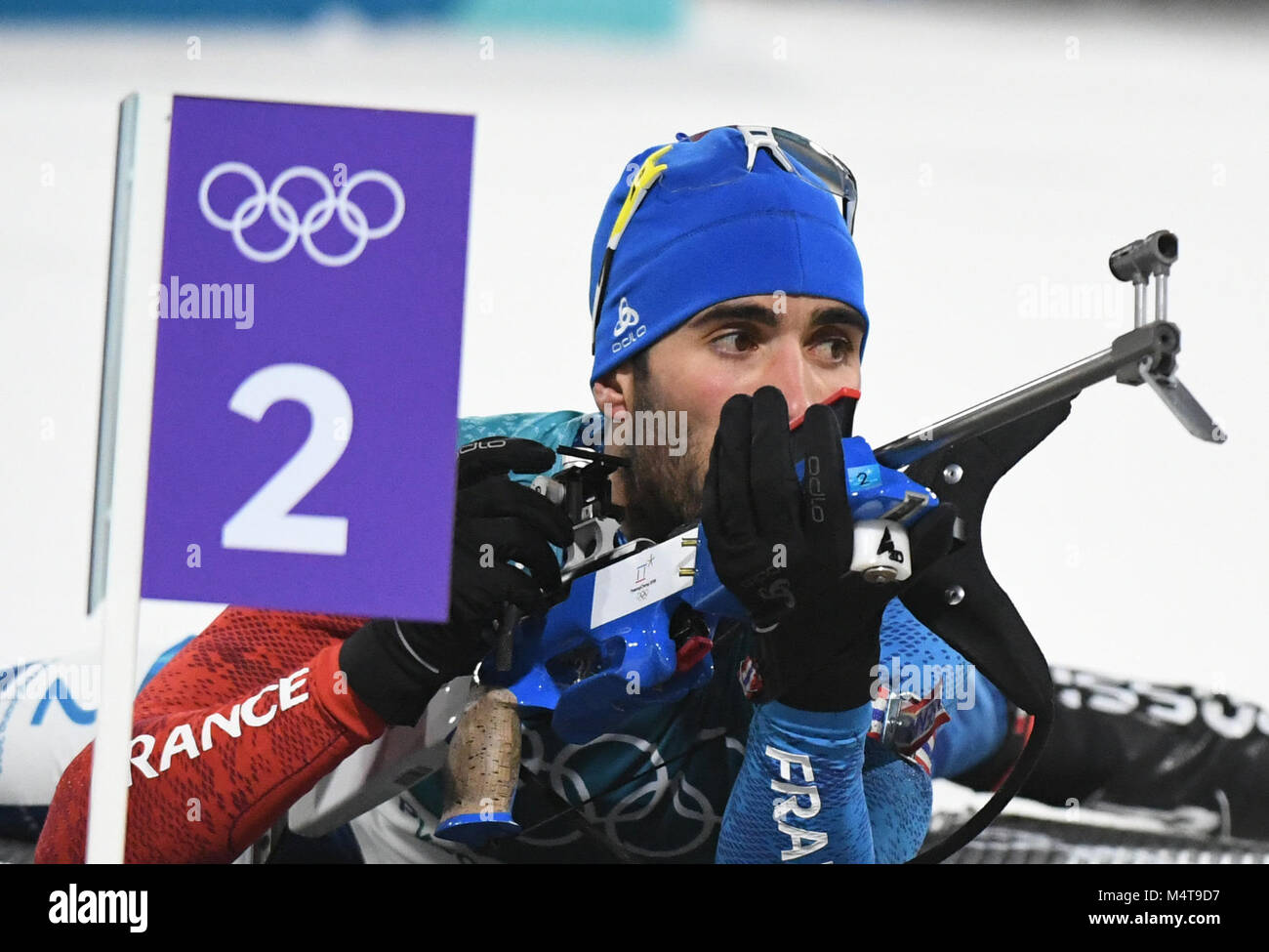 Pyeongchang. 18 Febbraio, 2018. Martin Fourcade della Francia germogli durante uomini 15km massa evento di inizio del biathlon al 2018 PyeongChang Giochi Olimpici Invernali a Alpensia Centro Biathlon, Feb.18?2018 Martin Fourcade della Francia ha sostenuto il campione in un tempo di 35:47.3. Credito: Wang Haofei/Xinhua/Alamy Live News Foto Stock