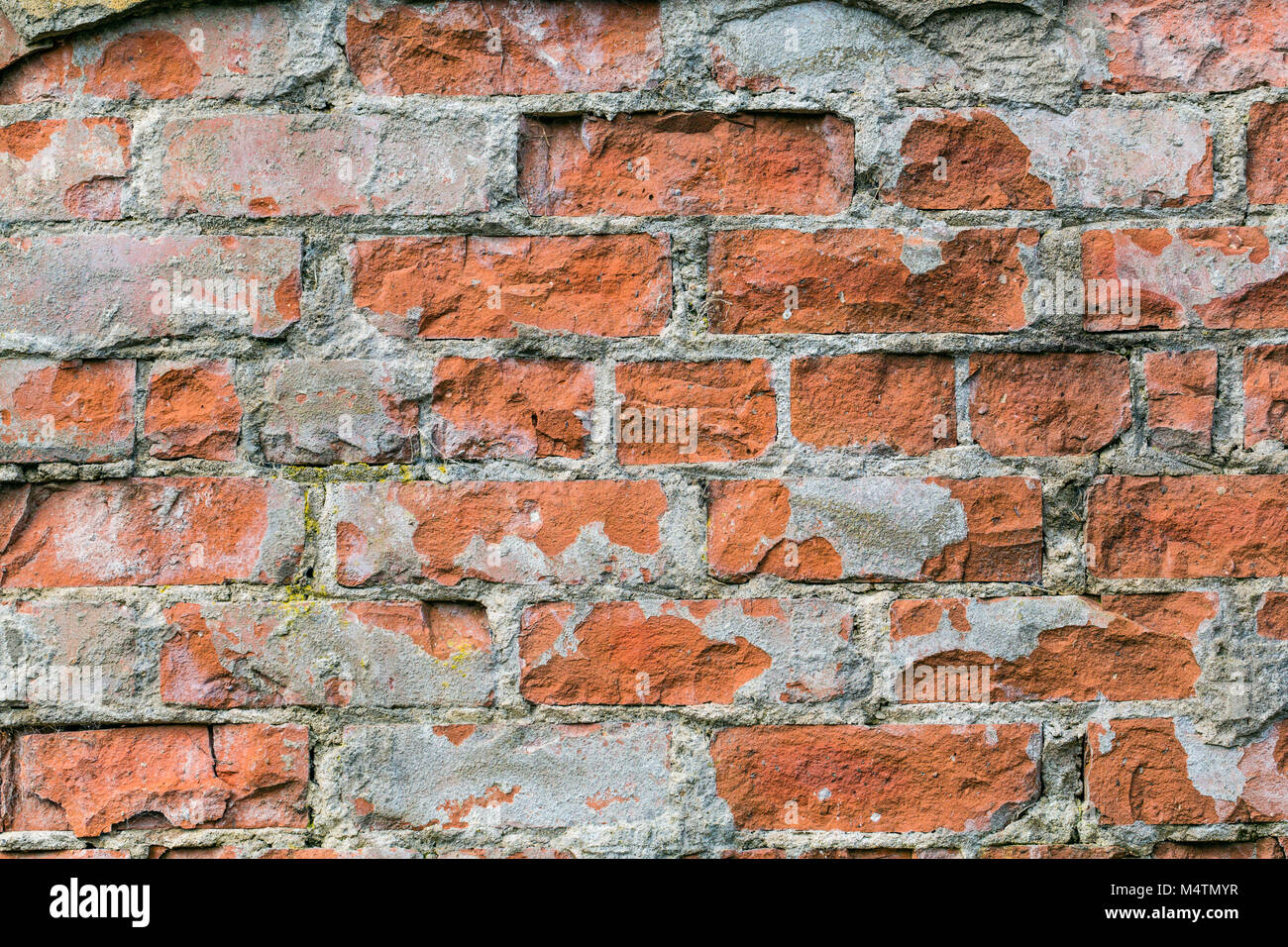 Un decadimento muro di mattoni Foto Stock