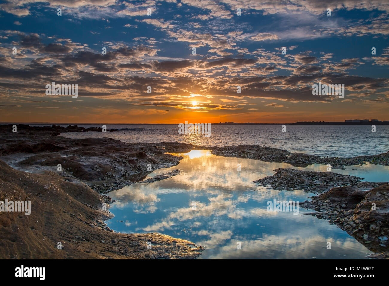 Tramonto a La Perouse con piscina di riflessione, Sydney, Australia Foto Stock