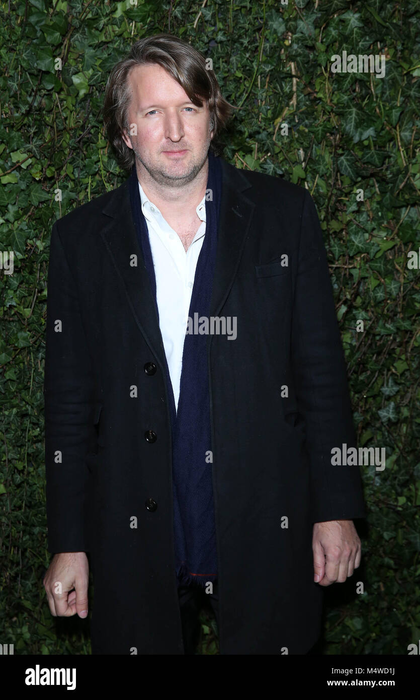 Tom Hooper arrivando al Charles Finch e Chanel pre-Bafta party presso il Mark's Club di Mayfair, Londra. Foto Stock