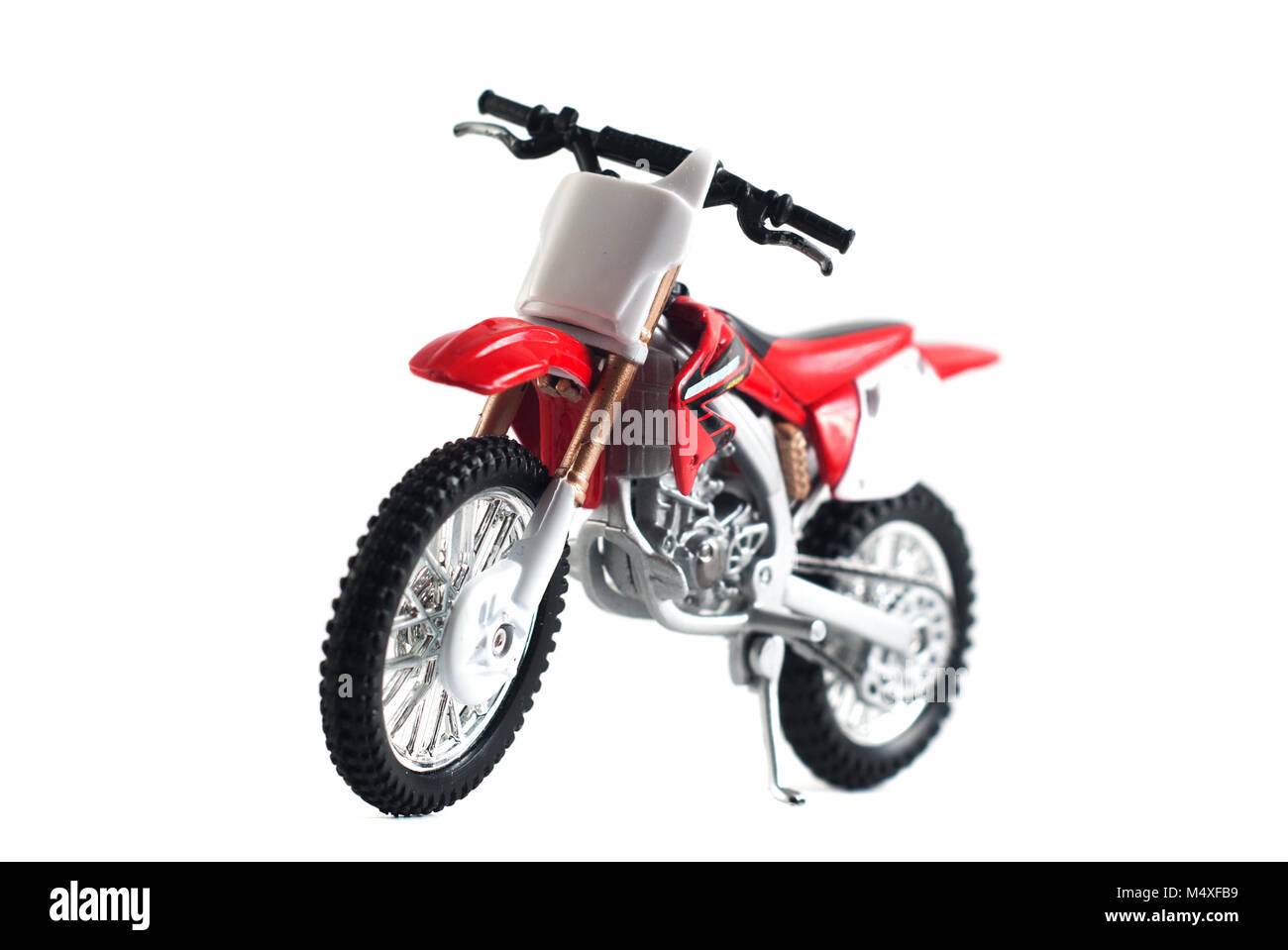 Red moto giocattolo isolato rosso su sfondo bianco, giocattolo di